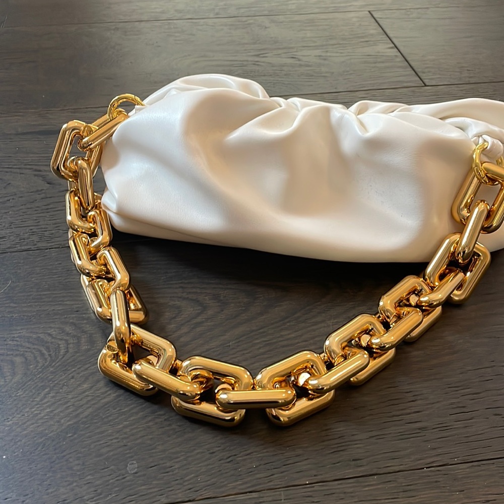Creamy white never worn clutch with large chunky chain. Bottega Veneta inspired